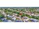 Charming single-Gathering home featuring a well-maintained front yard and a private driveway at 3036 Rose St, Sarasota, FL 34239