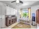 Bright kitchen featuring custom cabinets and an eye-catching hutch with decorative details at 3036 Rose St, Sarasota, FL 34239