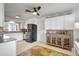 Bright kitchen featuring granite countertops and stainless steel appliances at 3036 Rose St, Sarasota, FL 34239