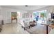 Inviting living room with a comfortable seating arrangement and plenty of natural light at 3036 Rose St, Sarasota, FL 34239