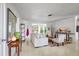 Inviting living room with a comfortable seating arrangement and plenty of natural light at 3036 Rose St, Sarasota, FL 34239