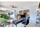 Bright, open living space with ample natural light, featuring modern decor and a glimpse into the dining area at 3036 Rose St, Sarasota, FL 34239