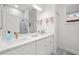 Bathroom featuring double vanity, walk-in shower, and contemporary fixtures at 3415 162Nd E Ave, Parrish, FL 34219