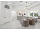 Bright living room featuring neutral decor, a modern chandelier, and views of the outdoor area at 3415 162Nd E Ave, Parrish, FL 34219