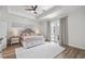 Spacious main bedroom boasts wood floors and access to an outdoor patio at 3415 162Nd E Ave, Parrish, FL 34219