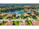Gorgeous aerial view of an upscale community with a lake and lush landscaping at 356 Blackbird Ct, Bradenton, FL 34212