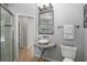 Bathroom with modern vanity, marble countertop, glass shower, and tile floors at 356 Blackbird Ct, Bradenton, FL 34212