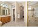 Bright bathroom featuring tiled floor, glass block window and a glass shower stall at 356 Blackbird Ct, Bradenton, FL 34212
