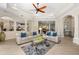 Spacious living room with neutral tones, decorative rug, and stylish furnishings for a relaxed atmosphere at 356 Blackbird Ct, Bradenton, FL 34212