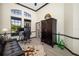 Comfortable office space with hardwood floors, dark trim, and natural light from large windows at 356 Blackbird Ct, Bradenton, FL 34212