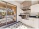 This outdoor kitchen features stainless steel appliances and granite countertops at 356 Blackbird Ct, Bradenton, FL 34212