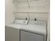 Laundry room equipped with a washing machine and a dryer at 3602 Bonaventure Ct, Sarasota, FL 34243
