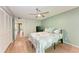 Bright bedroom with ample closet space, ceiling fan, and coastal-themed bedspread at 3803 Sun Eagle Ln # 203, Bradenton, FL 34210