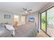 Bedroom with a view and modern features, includes private balcony access and ensuite bath at 3803 Sun Eagle Ln # 203, Bradenton, FL 34210