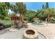 Outdoor entertaining area features a fire pit, hot tub, and seating at 3803 Sun Eagle Ln # 203, Bradenton, FL 34210