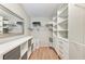 Spacious walk-in closet with built-in shelving and ample storage space at 3803 Sun Eagle Ln # 203, Bradenton, FL 34210