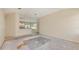 Bright living area with open access to the kitchen space, ready for personalization at 4092 Green Tree Ave, Sarasota, FL 34233
