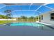 Enjoy this beautiful screened-in pool with crystal clear water and room to lounge at 4092 Green Tree Ave, Sarasota, FL 34233