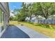 Fenced backyard offering a stone patio and fire pit, perfect for entertaining at 4513 Abacos Pl, Bradenton, FL 34203