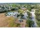 Aerial view of community amenities with a pool, tennis courts, and playground in a well-maintained neighborhood at 4513 Abacos Pl, Bradenton, FL 34203