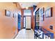 Bright foyer with tile flooring, high ceilings, and natural light streaming through a large window at 4513 Abacos Pl, Bradenton, FL 34203