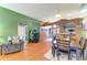 Comfortable living room showcasing wood floors and access to the bedroom at 4513 Abacos Pl, Bradenton, FL 34203