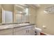 Well-lit bathroom with granite countertop, single sink, and sliding glass shower doors at 4691 Las Brisas Ln, Sarasota, FL 34238