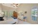 Bright bedroom with vaulted ceiling, shutters, and neutral decor at 4691 Las Brisas Ln, Sarasota, FL 34238