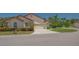 Charming villa with a tile roof and a two car garage at 4691 Las Brisas Ln, Sarasota, FL 34238