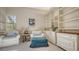 Bright living room with comfortable seating, built-in shelving, and natural light at 4691 Las Brisas Ln, Sarasota, FL 34238