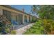 Private patio with direct access to the lanai and garden area at 4691 Las Brisas Ln, Sarasota, FL 34238