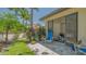 Private patio with a paver floor, open access to lanai and lush landscaping at 4691 Las Brisas Ln, Sarasota, FL 34238