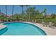 Community pool area, with a separate spa and plenty of seating at 4691 Las Brisas Ln, Sarasota, FL 34238