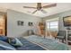 Relaxing bedroom with access to the sunroom and a serene water view at 4800 Gulf Of Mexico Dr # 205, Longboat Key, FL 34228