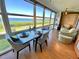 Bright dining area features panoramic water views and comfortable seating, perfect for enjoying meals at 4800 Gulf Of Mexico Dr # 205, Longboat Key, FL 34228