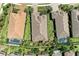 Overhead aerial view of a home showcasing its well-manicured lawn, landscaping, and pool at 4908 Tivoli Run, Bradenton, FL 34211