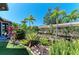 Manicured landscaping surrounds beautiful backyard water feature at 4908 Tivoli Run, Bradenton, FL 34211