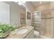Modern bathroom featuring a glass shower, modern vanity, and contemporary fixtures at 4908 Tivoli Run, Bradenton, FL 34211