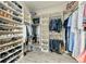 Spacious walk-in closet with ample storage for clothes and shoes at 4908 Tivoli Run, Bradenton, FL 34211