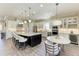 Bright kitchen with an island, stainless steel appliances, modern cabinetry, and a breakfast nook at 4908 Tivoli Run, Bradenton, FL 34211