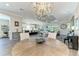 Open concept living area with kitchen, dining, and living spaces, perfect for entertaining guests at 4908 Tivoli Run, Bradenton, FL 34211