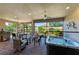 The outdoor patio features an above-ground hot tub and comfortable seating at 4908 Tivoli Run, Bradenton, FL 34211
