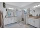 Bright bathroom boasts granite countertops, a modern shower, and plentiful vanity space at 4975 Seafoam Trl, Bradenton, FL 34211