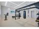 Gym with various machines, tv, mirrors and weights for a comprehensive work out experience at 4975 Seafoam Trl, Bradenton, FL 34211
