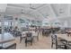 Spacious restaurant with many tables, tv's and open patio for residents to enjoy a meal at 4975 Seafoam Trl, Bradenton, FL 34211