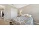 Well lit bedroom with a closet, carpet floors and neutral paint at 5403 Mang Pl, Sarasota, FL 34238