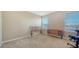 Bedroom with natural light, carpet floors and neutral paint at 5403 Mang Pl, Sarasota, FL 34238