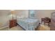 Comfortable bedroom featuring natural light from the window, carpet floors and neutral paint at 5403 Mang Pl, Sarasota, FL 34238