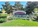 Beautiful Palmer Oaks community entrance sign surrounded by lush landscaping and manicured lawns at 5403 Mang Pl, Sarasota, FL 34238
