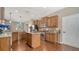 Kitchen with granite countertops, stainless steel appliances, and a central island at 5403 Mang Pl, Sarasota, FL 34238